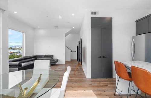 Tri-West Apartment | MidCity 3BR/2BA Townhome with Rooftop, 5 Beds & 2-Car Parking