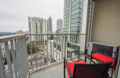 Midtown Apartment | Midtown LuxePad 1B1B with Pool Gym Grills Xbox