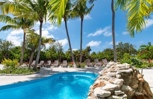 North Palmetto Point Condo | Migrate Beach Chalets #4, sleeps 7. N Palmetto Point. WiFi. AC. Pools. Paradise!