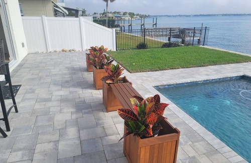 Treasure Island Villa | Million Dollar Views! Waterfront 2 bedroom/2 bath duplex with pool and dock.