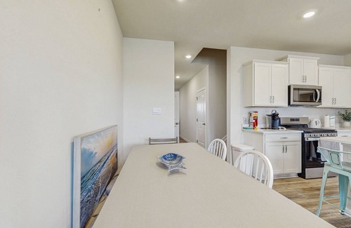 Millville House | Millville by the Sea townhome with clubhouse, pools & wellness center access