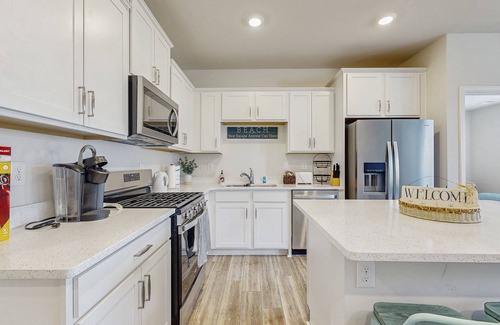 Millville House | Millville by the Sea townhome with clubhouse, pools & wellness center access
