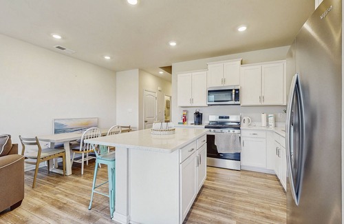 Millville House | Millville by the Sea townhome with clubhouse, pools & wellness center access