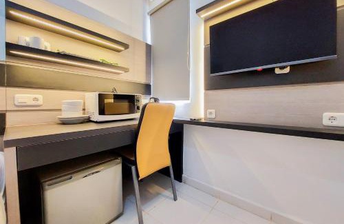 Tangerang Apartment | Minimalist Studio Apartment (No Kitchen) at Aeropolis Residence By Travelio