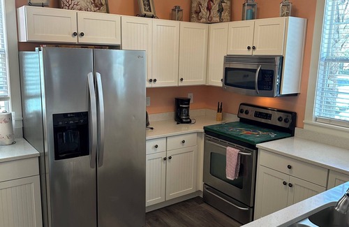 Port St. Joe Cottage | Minutes from sandy beaches. In gated community with pools, hot tub, fitness room