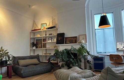 Mission District Apartment | Mission jewel box filled with art and classic furniture, Garage parking & AC