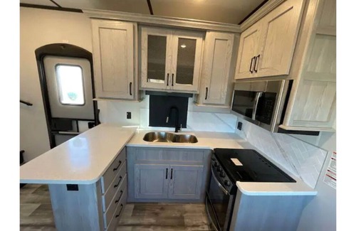 Suttons Bay House | Mobile Getaway, "Up North", Luxury Camping;