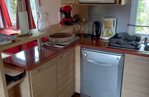 Claouey House | Mobile home rental in a 4-star campsite les embruns facing the forest.