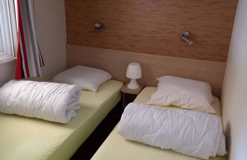 Claouey House | Mobile home rental in a 4-star campsite les embruns facing the forest.