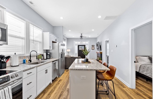 Manchester House | Mod Urban 2 BR with Fireplace and Private Backyard