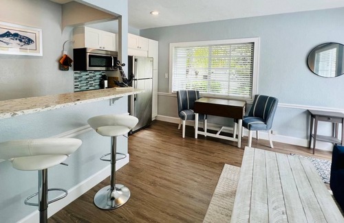 Parrot Cove Apartment | Modern 1 bedroom villa just five minutes to the beach!