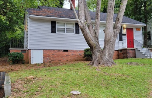 Fayetteville House | Modern 2 bedroom 1 bath home with barbeque grill and sauna pool.