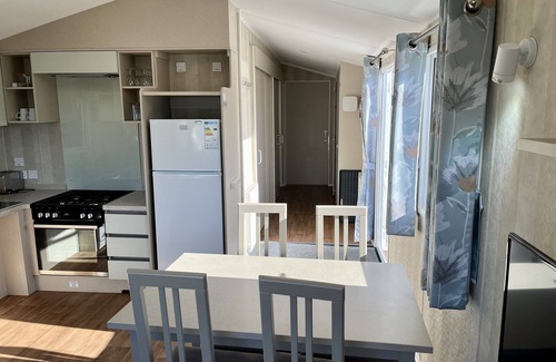 Weymouth House | Modern 2 bedroom caravan. Disabled friendly with wetroom & fab sun deck.