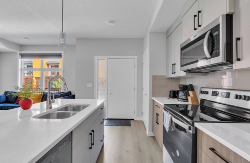 Southwest Calgary House | Modern 2BR Townhome in Belmont | AC & Parking