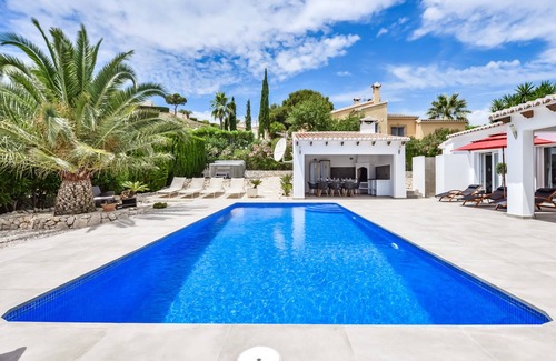 Arnella Villa | Modern 3-bed Villa with Heated Private Pool, Hot Tub, Sea views, & Garden