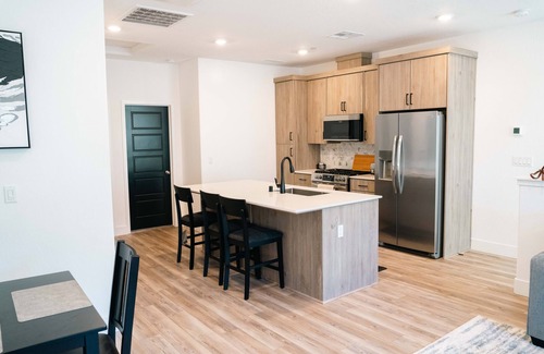Clovis House | Modern 3-bedroom 2-bath townhome, perfectly balancing comfort and accessibility.