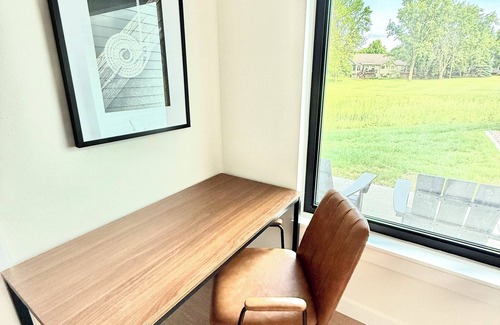 Arnolds Park Condo | Modern 3-Story Condo Across from Arnold’s Park – Walk to Fun, Lake, & Dining!