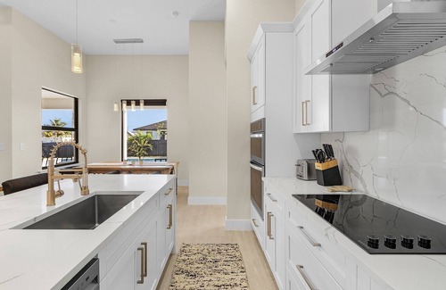Burnt Store House | Modern 4-bed home with private heated pool, outdoor bar and grill in Cape Coral!