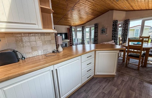 Hunstanton Cabin | Modern 4 berth lodge with decking at Manor Park in Hunstanton ref 23024W