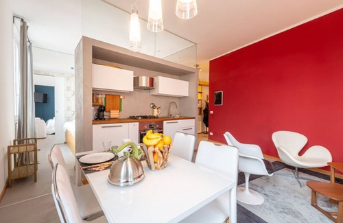 Oltretorrente Apartment | Modern 60 sqm apartment located on the fourth floor of a renovated 30's building without a lift (stairs to access it).The apartment consists of a living room with kitchenette, bedroom and bathroom. The bedroom is inspired by La Chayhana in Uzbekistan, a