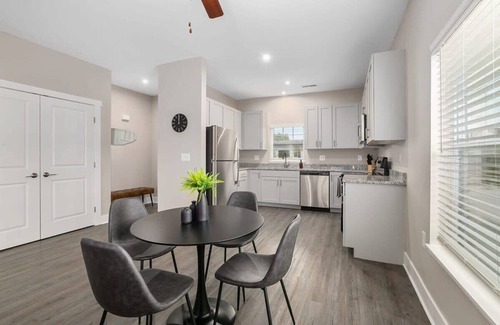 Grandville Apartment | Modern 8BR 8BA Condo w Garage and Patio