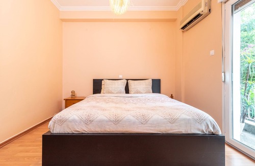 Ampelokipoi Apartment | Modern African-inspired flat