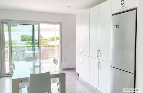 Salir do Porto Apartment | Modern, air-conditioned family apartment with pool. 10 minute walk to beach