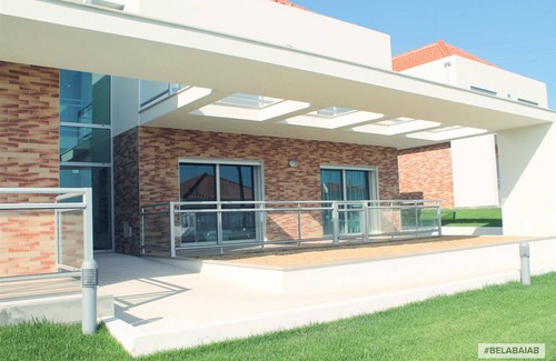 Salir do Porto Apartment | Modern, air-conditioned family apartment with pool. 10 minute walk to beach