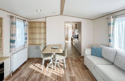 Bleadon House | Modern and contemporary 12ft-wide caravan with two twin.