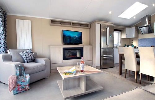 Swanage Ski Chalet | Modern and contemporary two bedroomed lodge with one double and one twin.