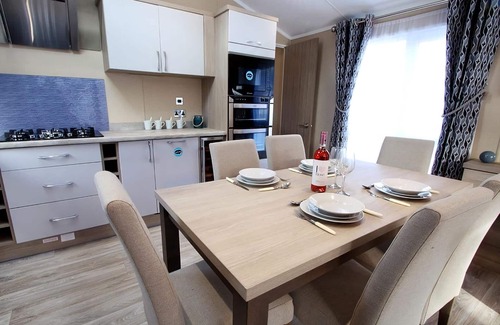 Swanage Ski Chalet | Modern and contemporary two bedroomed lodge with one double and one twin.