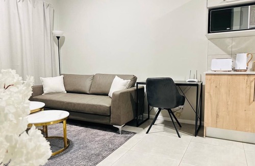 Equestria Apartment | Modern and tranquil apartment nestled near vibrant shopping centre's and malls!