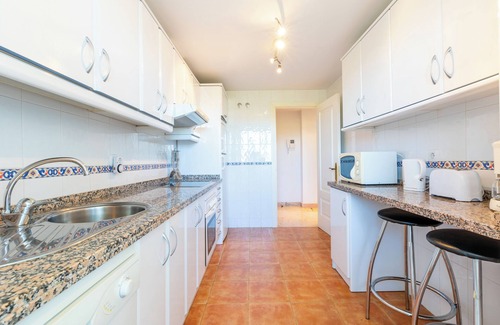 La Cala de Mijas Apartment | Modern Apartment 'In Jardin Botanico' with Sea View, Pool, Wi-Fi, Garden & Terrace