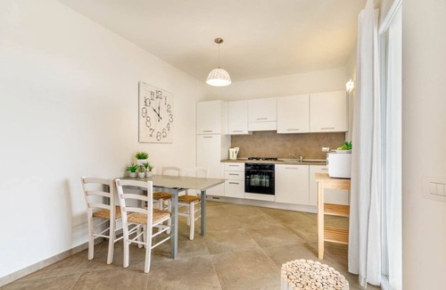 Monte Petrosu Apartment | modern apartment 5 min from the sea with air conditioning, swimming pool, wi-fi
