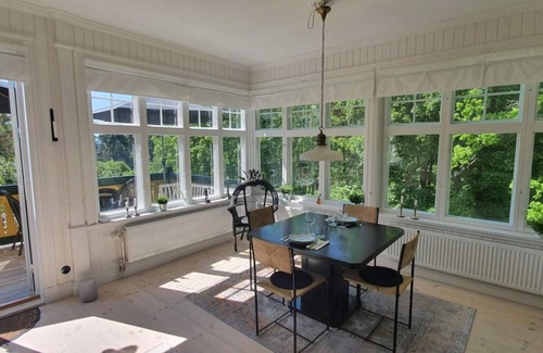 Solna Apartment | Modern apartment in 19th-century villa close to city, sea and royal gardens.