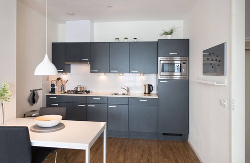 Vissershaven Apartment | Modern apartment near the beach