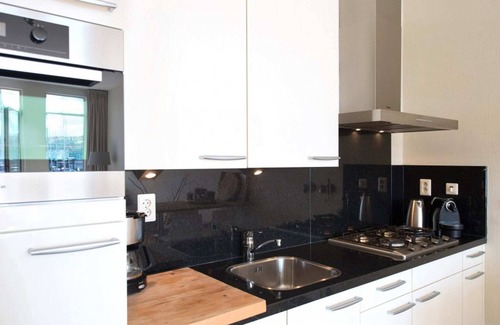 Vissershaven Apartment | Modern apartment overlooking the harbor