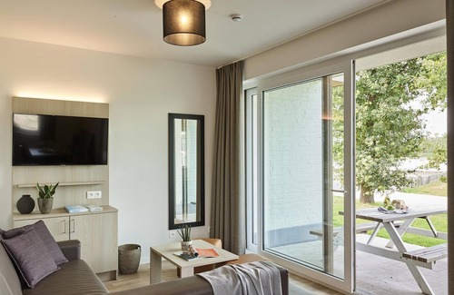 Jabbeke Apartment | Modern apartment with dishwasher, on a resort, near a recreational lake