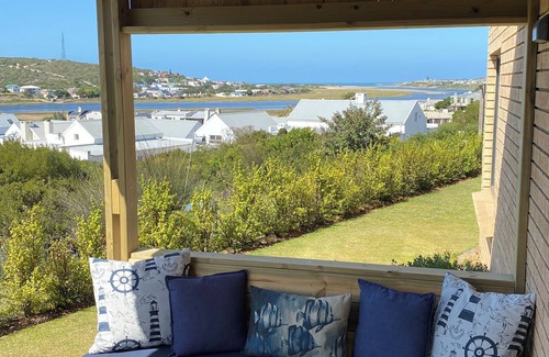 Still Bay Apartment | Modern apartment with sea, river & garden view in charming Still Bay. No smoking