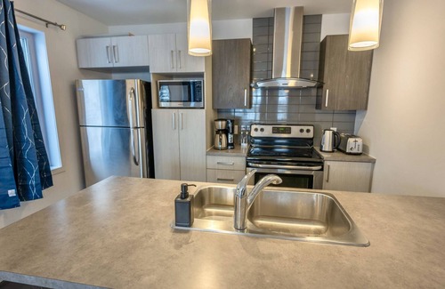 Laval-des-Rapides Apartment | Modern apartments 2 Bedrooms 4 beds AC Wi-Fi Free Parking Smart TV