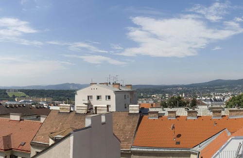 Rudolfsheim-Funfhaus Apartment | Modern, Architect-Designed Penthouse Loft With 2 Outdoor Roof Terraces