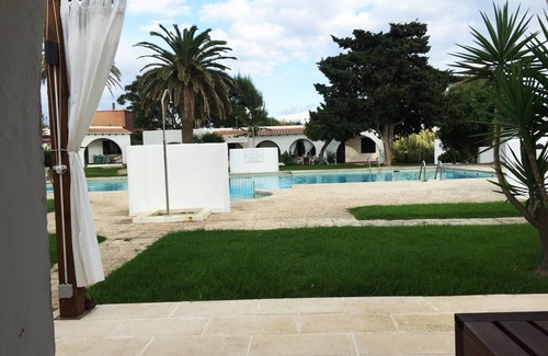 Binisafua Apartment | Modern Bungalow "Binisafua Playa - Bungalow 14" Near the Beach with Shared Outdoor Pool, A/C, Wi-Fi, Terrace & Garden; Parking Available