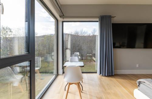 Stamford Villa | Modern Catskill House & Lake NY with hot tube on the roof