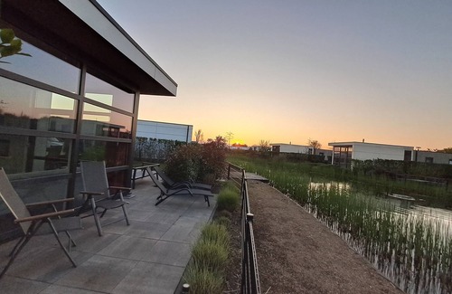 Olburgen House | Modern chalet with fenced garden, sauna, outdoor pool and river view in Olburgen