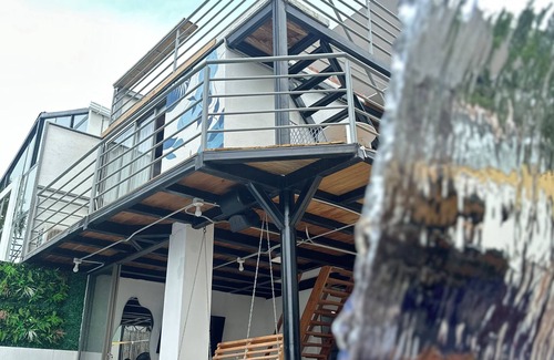 Turbaco Ski Chalet | Modern chalet with private pool, perfect for relaxing surrounded by nature.