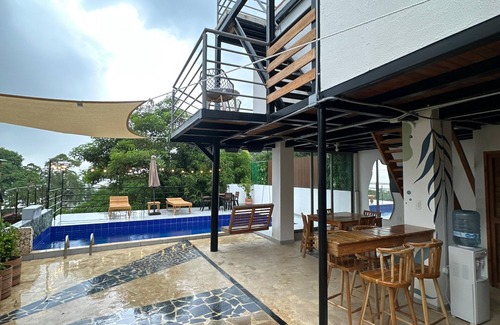 Turbaco Ski Chalet | Modern chalet with private pool, perfect for relaxing surrounded by nature.