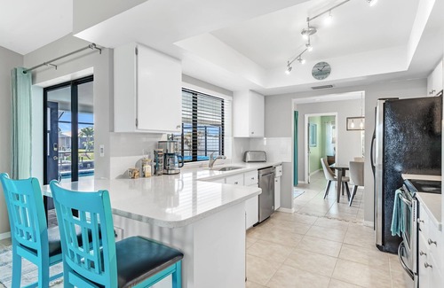 Cape Coral House | Modern Coastal Home w/Heated Pool & Waterfront Views!