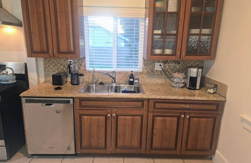 South Wrigley House | Modern Comfy Gem: 5 star Location, with Yard & Parking