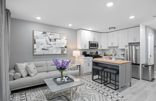 The Heights House | Modern Condo with Private Porch, Mins to NYC