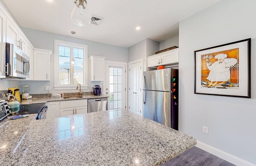 Kennebunkport Condo | Modern condo with private gas grill, shared pool, game room, and fitness center